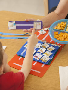 Child making request using PECS