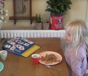 child using PECS at home