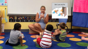 Teacher leading a fire safety lesson