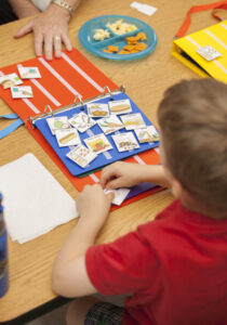 Child with a communication book