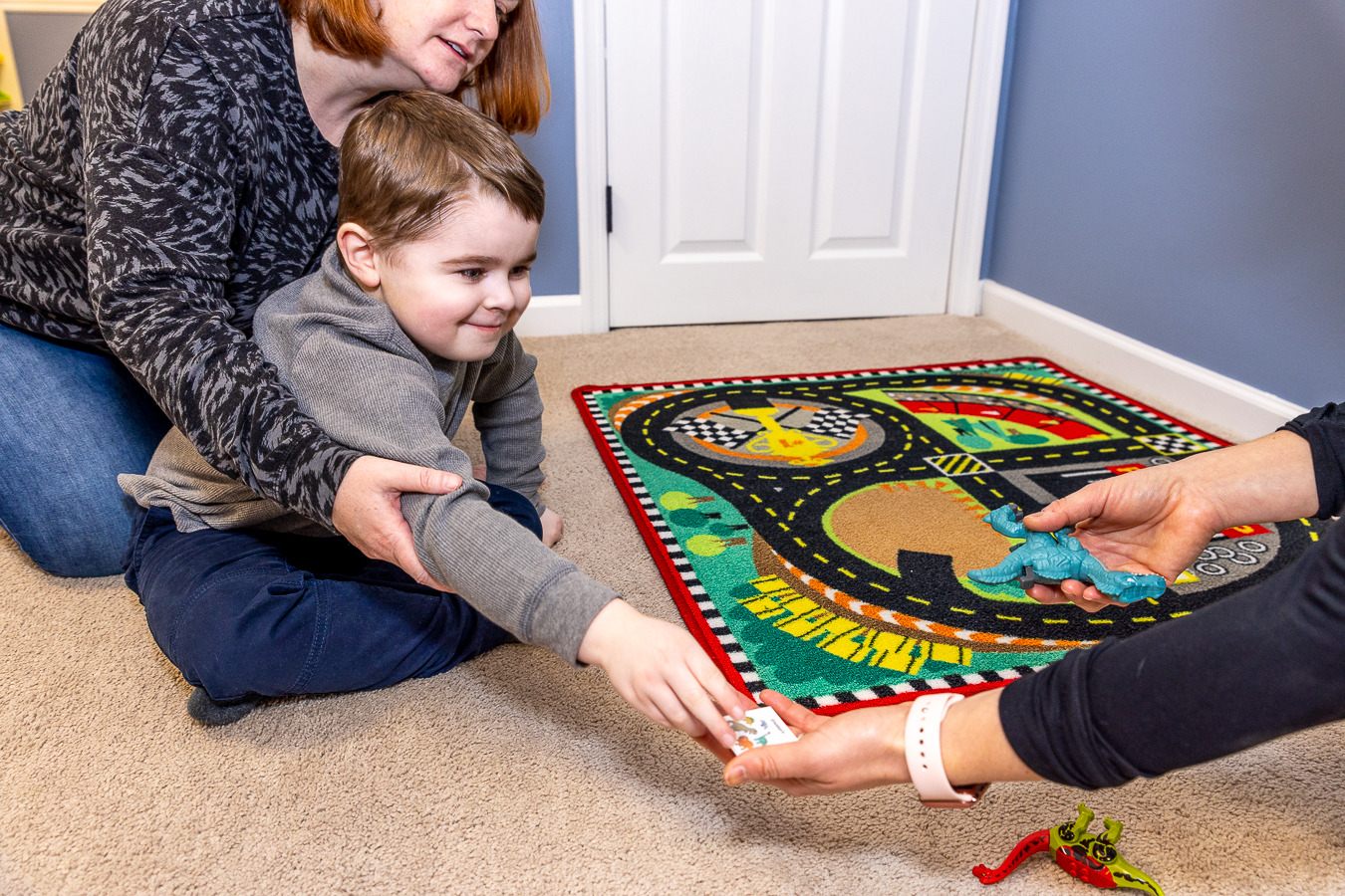 boy exchanging picture to receive a toy