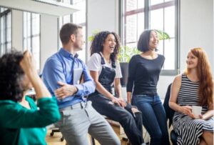group of adults talking 